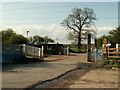 TL9525 : The level crossing at Chitts Hills by Robert Edwards