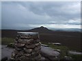 NJ6622 : Summit Indicator on Oxen Craig looking towards Mither Tap by Sarah Charlesworth