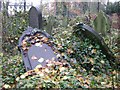 SP0590 : Fallen memorials, Handsworth parish churchyard by Robin Stott