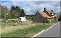 NT8463 : Roadside cottage at Houndwood by James Denham