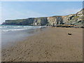 SX0486 : Trebarwith Strand and the cliffs at the north end of Hole Beach by Richard Law