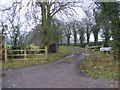 TM2651 : Footpath to Blacksmiths & Manor Roads  & entrance to Manor Farm by Geographer