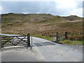 SN7386 : Gate and cattle grid on the road around Nant-y-moch Reservoir by Jeremy Bolwell