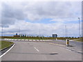 TL2762 : Roundabout on the A1198 Papworth Everard Bypass by Geographer