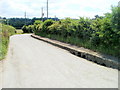 SN7131 : Unexpected pavement on the road to Llanwrda railway station by Jaggery