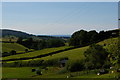 SS9344 : View northwest to the sea, from the lane between Wootton Courtenay and Tivington by Christopher Hilton