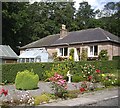 NJ6201 : Cottage garden, Torphins by Stanley Howe