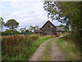 TM3966 : North Green Farm Barns by Geographer