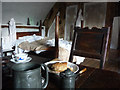 SH7877 : Bed and table, furnished attic room at Plas Mawr by Phil Champion