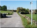 SE2606 : Public footpath along Pashley Green Farm track by Christine Johnstone