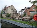 SK6580 : Beer garden and moorings at the Chequers Inn by Christine Johnstone