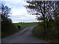 TM3585 : Footpath to High Street & Entrance to Highfield Farm by Geographer