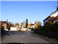 TM2677 : Stradbroke Road, Fressingfield & Fressingfield Village sign by Geographer