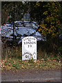 TM2245 : Milepost on the A1214 Woodbridge Road by Geographer