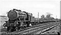 SE3692 : Down train of empty flat wagons for steel plates approaching Northallerton by Ben Brooksbank