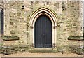 TQ2569 : St John the Divine, High Path, Merton - Doorway by John Salmon