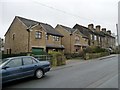 SE1910 : Contrasting houses on Station Road by Christine Johnstone