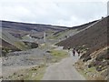 NY9700 : Cyclists approaching Old Gang Smelting Mill by Christine Johnstone