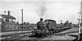 SU6775 : Down train of rails on flat-wagons at Tilehurst station by Ben Brooksbank