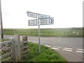 NU0340 : Sign at Crossroads near Black Heddon by Graham Robson