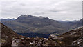 NG9864 : Cairn and perched boulder beside mountain path by Trevor Littlewood