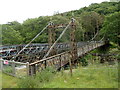 SN9364 : South side of the disused River Elan suspension bridge by Jaggery