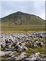 SD7375 : Limestone pavement with Ingleborough by Trevor Littlewood