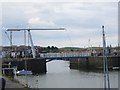 NY0336 : Footbridge across harbour entrance, Maryport by Graham Robson