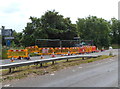 SO7100 : Road works at the SW edge of A38 railway bridge by Jaggery