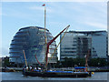 TQ3380 : Thames sailing barge passes City Hall by Graham Robson