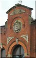 SJ8597 : Ardwick Conservative Club: Shield & Date stone by Gerald England