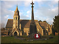 SD4692 : Poppy wreath on the war memorial, All Saint's Church, Underbarrow by Karl and Ali