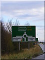 TL2960 : Roadsign on the A428 Cambridge Road by Geographer