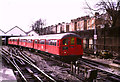 TQ2483 : Tube train at Queen's Park by Malc McDonald