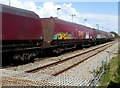 ST0666 : EWS wagons pass through Rhoose railway station by Jaggery