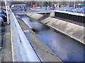 TL8565 : River at Tesco Bury St.Edmunds by Geographer