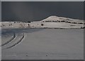 NO2103 : Tractor tracks in snow-covered field, East Feal by Becky Williamson