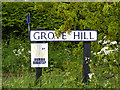 TM1341 : Grove Hill sign by Geographer