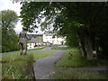 NT3235 : Statuary in front of Traquair House by Stanley Howe