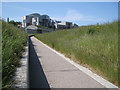 NT2673 : Path between 'tails', Scottish Parliament landscape by Robin Stott