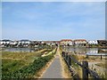 TQ2004 : Footbridge across Widewater Lagoon by Paul Gillett