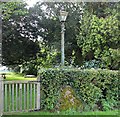 SO6851 : Standing stone, Stanford Bishop church by Bob Embleton