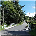 SO1068 : Road bridge over a stream, Llanddewi Ystradenni, Powys by Jaggery