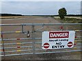 TL1886 : Former runway at Glatton Airbase, Conington by Richard Humphrey