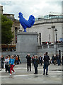 TQ2980 : Trafalgar Square - big blue cock by Chris Allen