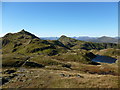 NN5838 : Tarmachan Ridge and lochans by Alan O'Dowd