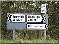 TM1043 : Roadsigns on the A1071 Thorpe's Hill & A1071 Hurdle Maker's Hill by Geographer