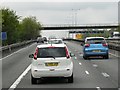 TQ3452 : Footbridge over the M25 near Godstone by David Dixon