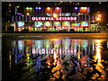 TA0488 : Olympia Leisure across a wet beach by John S Turner