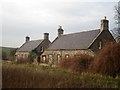 NT9362 : Derelict cottages at Ayton Mains by Graham Robson